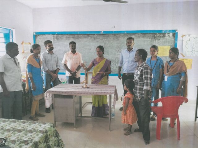 Guests, staff and children at the ceremony