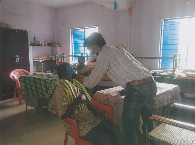 Eye examination of an elderly patient during the camp